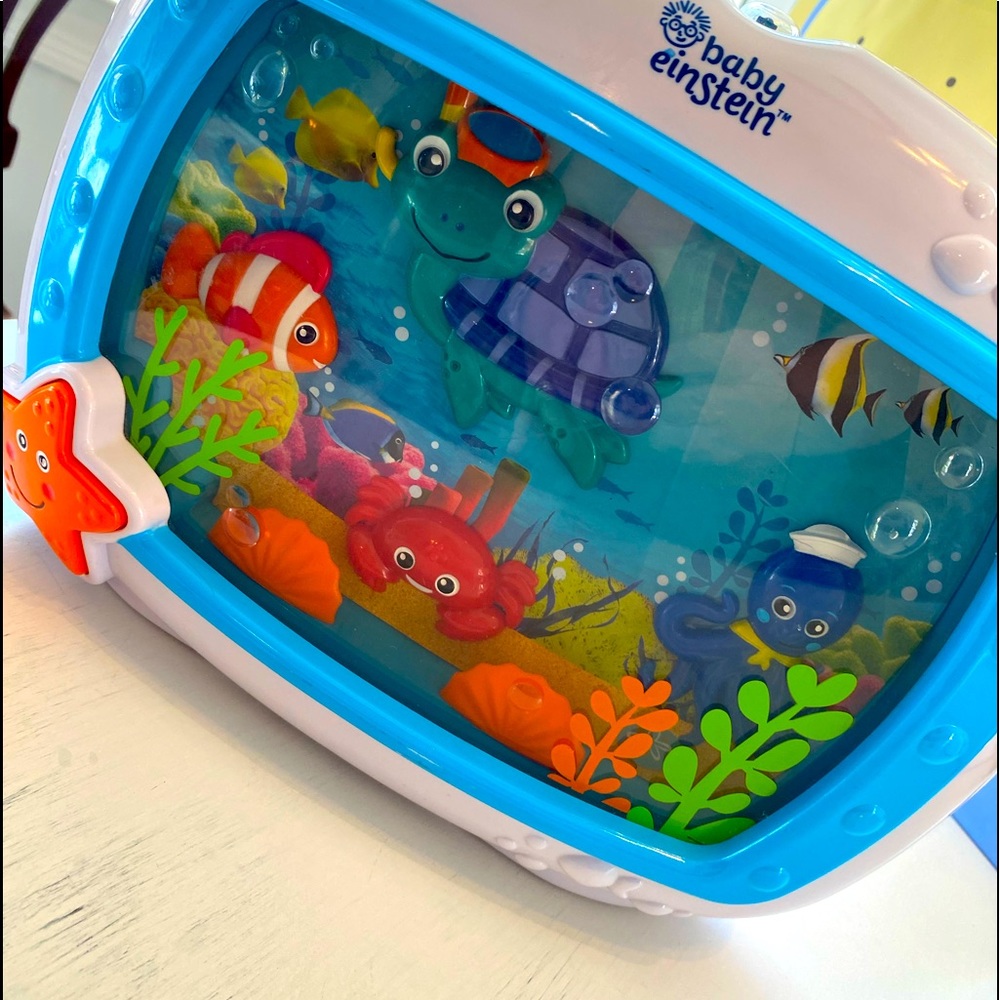 Baby Einstein Under the Sea music box. Back crib attachment missing.